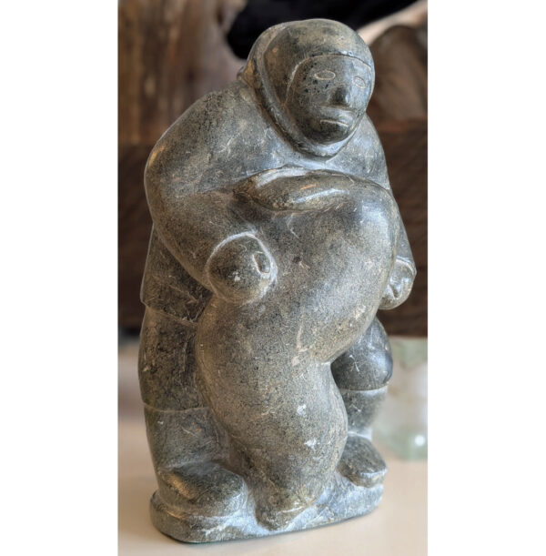 Alaskan "Man Holding a Seal" Serpentine Stone Carving